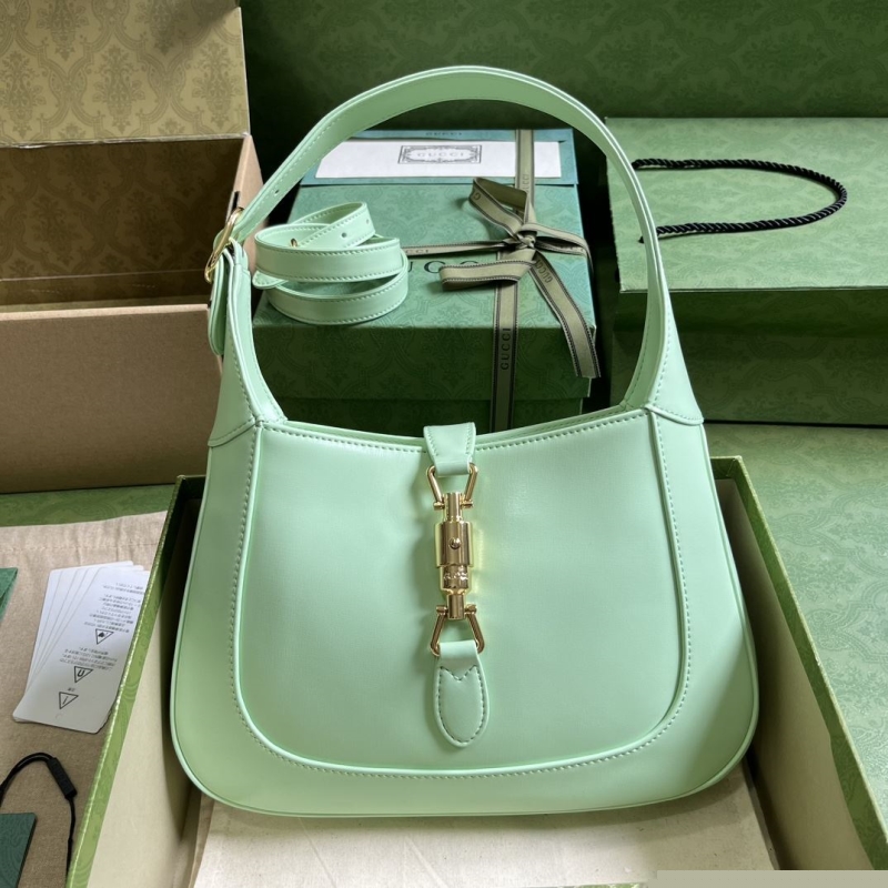 G*u*i top handle bags